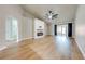 Bright living room with fireplace and vinyl plank flooring at 1720 Christina Lee Lane, Saint Cloud, FL 34769