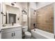 Clean bathroom with single vanity, toilet, and tub shower combo at 1800 Houston St, Kissimmee, FL 34743
