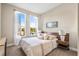Comfortable bedroom with large windows, a view, and neutral decor at 1800 Houston St, Kissimmee, FL 34743