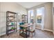 Home office with built-in shelving and large windows at 1800 Houston St, Kissimmee, FL 34743