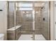 Large walk-in shower with glass enclosure and tiled walls at 1800 Houston St, Kissimmee, FL 34743