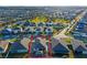 Aerial close-up view of a single-Gathering house with solar panels at 1869 Brockridge Rd, Kissimmee, FL 34744