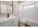 Updated bathroom with white tile, a bathtub, and a modern vanity at 2303 Merrimack Dr, Kissimmee, FL 34743