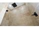 Large shower with beige tile and a rain shower head at 2303 Merrimack Dr, Kissimmee, FL 34743