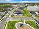 Aerial view of neighborhood with playground, showcasing homes and streets at 234 Mosaic Blvd, Daytona Beach, FL 32124