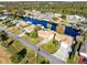 Aerial view showcasing a canal-front home and neighborhood at 2545 Harris Blvd, Kissimmee, FL 34746