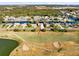 Aerial view showing home's location in community by golf course at 2545 Harris Blvd, Kissimmee, FL 34746