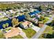 Aerial view of a canal-front house and surrounding area at 2545 Harris Blvd, Kissimmee, FL 34746