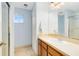 Bathroom with single sink vanity and shower/tub combo at 2545 Harris Blvd, Kissimmee, FL 34746