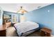Bedroom with ceiling fan, window, and neutral color walls at 2545 Harris Blvd, Kissimmee, FL 34746