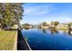 Scenic view of a calm canal with waterfront homes at 2545 Harris Blvd, Kissimmee, FL 34746
