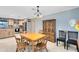 Charming dining area with wooden table and hutch at 2545 Harris Blvd, Kissimmee, FL 34746