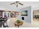 Open floor plan living room, kitchen, and stairs at 2545 Harris Blvd, Kissimmee, FL 34746