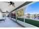 Relaxing screened porch overlooking calm waters at 2545 Harris Blvd, Kissimmee, FL 34746