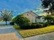 House with a landscaped yard and driveway at 3799 Cedar Hammock Trl, Saint Cloud, FL 34772