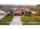 House exterior view with driveway and landscaping at 3907 Baja Dr, St Cloud, FL 34772