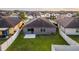 House with backyard and surrounding homes visible at 3907 Baja Dr, St Cloud, FL 34772