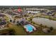 Aerial view of the community pool, playground, and surrounding homes at 3907 Baja Dr, Saint Cloud, FL 34772