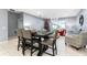Bright dining room with seating for four, near living area at 3907 Baja Dr, St Cloud, FL 34772