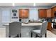 Granite kitchen island with seating for two at 3907 Baja Dr, St Cloud, FL 34772