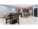 Spacious kitchen with island, stainless steel appliances, and wood cabinets at 3907 Baja Dr, St Cloud, FL 34772