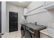 Laundry room with washer, dryer, and storage cabinets at 3907 Baja Dr, St Cloud, FL 34772