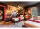 Themed bedroom with twin beds, a Harry Potter mural, and a unique chandelier at 4141 Lana Ave, Davenport, FL 33897