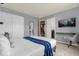 Well-lit bedroom with attached bathroom and game room access at 4141 Lana Ave, Davenport, FL 33897