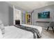 Spacious main bedroom with ensuite bathroom, walk-in closet, and TV at 4141 Lana Ave, Davenport, FL 33897
