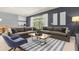 This cozy living area opens up to the dining and kitchen spaces at 4141 Lana Ave, Davenport, FL 33897
