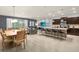Spacious open floorplan seamlessly connecting the kitchen, dining, and living areas at 4141 Lana Ave, Davenport, FL 33897