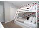 bedroom with a bunk bed and Mickey Mouse decor at 4403 Le Reve Ct, Kissimmee, FL 34746