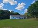 Single-story house on a spacious lot with lush lawn at 4423 Reaves Rd, Kissimmee, FL 34746