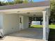 Attached carport with storage shed in the backyard at 4423 Reaves Rd, Kissimmee, FL 34746