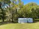Two storage sheds in backyard, one large and one small at 4423 Reaves Rd, Kissimmee, FL 34746