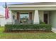 Landscaped front yard with neatly trimmed hedges at 4642 Calumet Dr, Saint Cloud, FL 34772