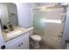 Clean bathroom with granite countertop, updated vanity, and a tub shower combo at 504 Ridge View Dr, Davenport, FL 33837