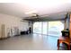 Garage with storage space and overhead door opener at 504 Ridge View Dr, Davenport, FL 33837