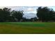 Golf course view with birds on the green at 504 Ridge View Dr, Davenport, FL 33837
