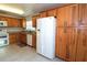 Spacious kitchen with ample wood cabinetry and granite countertops at 504 Ridge View Dr, Davenport, FL 33837