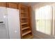 Kitchen pantry with ample storage space and wooden shelves at 504 Ridge View Dr, Davenport, FL 33837