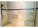 Large shower with built-in shelving and a comfortable corner seat at 504 Ridge View Dr, Davenport, FL 33837