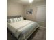 King-size bed and light blue bedding in bedroom at 5107 Killarney Way, Kissimmee, FL 34746