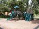 playground with climbing structures and slide at 5107 Killarney Way, Kissimmee, FL 34746