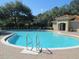 Community pool with lounge chairs at 5107 Killarney Way, Kissimmee, FL 34746