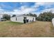 Large backyard with grassy area and shed at 608 Gila Dr, Kissimmee, FL 34759
