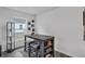 Small dining area with dark wood table and gray stools at 608 Gila Dr, Kissimmee, FL 34759