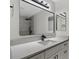 Updated bathroom with a quartz countertop and black fixtures at 8438 Bay Oak Ct, Orlando, FL 32810