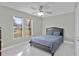 Spacious bedroom with large windows and marble floors at 8438 Bay Oak Ct, Orlando, FL 32810