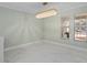 Bright dining room with marble floors and chandelier at 8438 Bay Oak Ct, Orlando, FL 32810